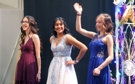 An exhuberent Sierra Buckmiller waves to the audiance after being introduced at Selection Night.