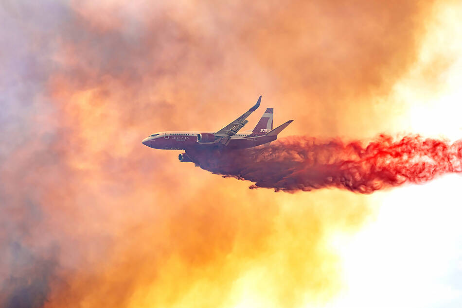 A plane drops fire retardant on the Pine Creek Fire in June of 2021. GT file photo
A plane drops fire retardant on the Pine Creek Fire in June of 2021. GT file photo