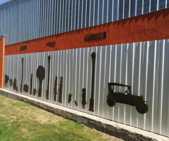 Centennial Park has a new mural based on the old mural depicting items from Oroville in 1908. The old mural, which was painted on boards was felt to be beyond repair and removed. The new one uses silhouettes cut from metal and was up in time for May Festival. <em>Gary De Von/staff photo </em>