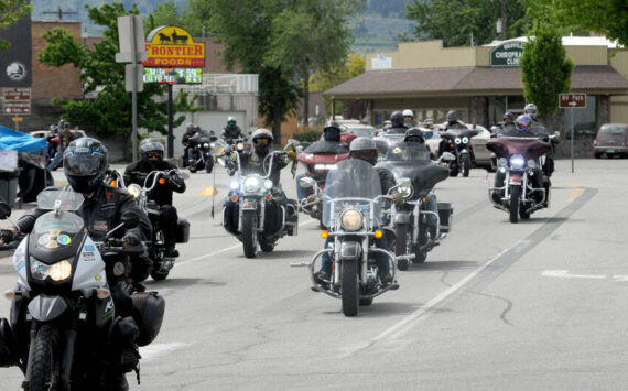There back! After a four-year absence, the Run for the Border Charity Motorcycle ride returned to Oroville for Armed Services Day on Saturday, May 18. The 150-mile ride from Wenatchee and back is sponsored by the Columbia River Harley Owners Group (HOG). This year 90 machines left Wenatchee for the journey north and arrived in Oroville around noon. <em>Gary DeVon/staff photo </em>