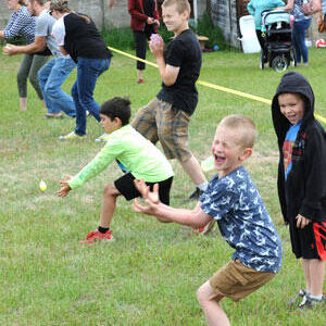 GT File Photo
Among the kids’ games is the water balloon toss, which on a hot day is a fun way to lose if it cools you off. There was also a sack race, egg toss, three-legged sack race and a coin scramble through the sawdust pile.