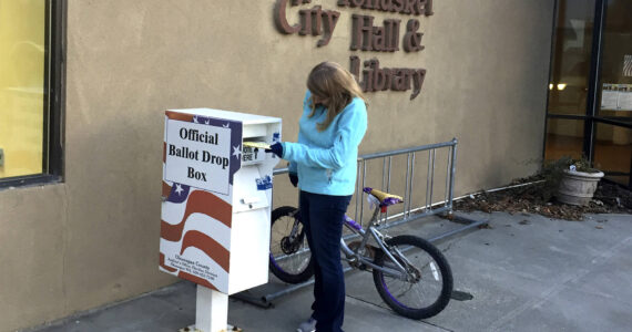 Gary DeVon/staff photo A Tonasket area voter drops her ballot off at one of three ballot boxes in the county. According to Tonasket Mayor Patrick Plumb and City Clerk Alice Attwood, the box outside City Hall has been well used, with voters dropping off their ballots as late as 7:59 p.m. on election night.
Gary DeVon/GT file photo