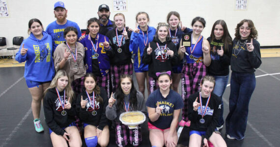Tonasket Tigers Girls Wrestling with their apple pie after winning their first-ever Girls Apple Pie Tournament on Jan. 18. Submitted photo