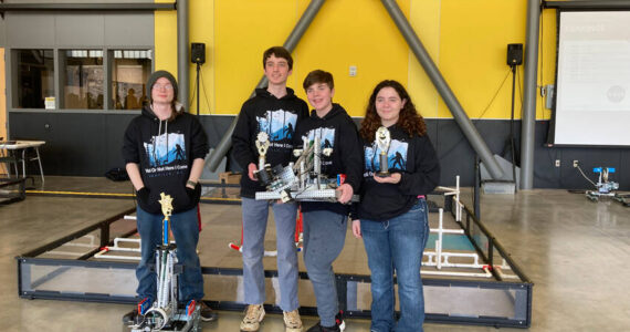 Oroville Team CWU09, l-r, with driver-engineer Elias DeFord, a junior; Jaxon Darley, a freshman; Travis Darley, a 7th grader and Erin Gimello, a sophomore, received the Tournament Champion award. Submitted photo