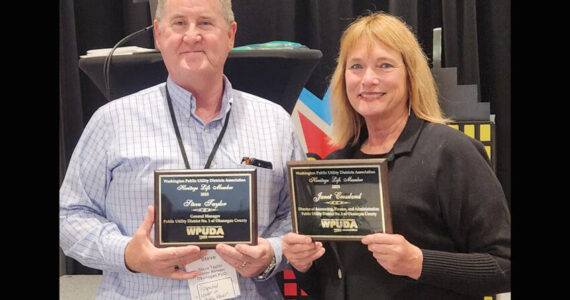 Okanogan County PUD General Manager Steve Taylor and Finance Manager Janet Crossland.