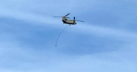 The Washington Air National Guard and U.S. Border Patrol conducted training exercises using Oroville’s Dorothy Scott International Airport last week. The use of the airport was approved by the council at their June 3 meeting. The WAARNG CH-47 Chinook twin-rotor helicopters could be seen flying around the blue skies of Oroville last Thursday. Gary De Von/staff photo