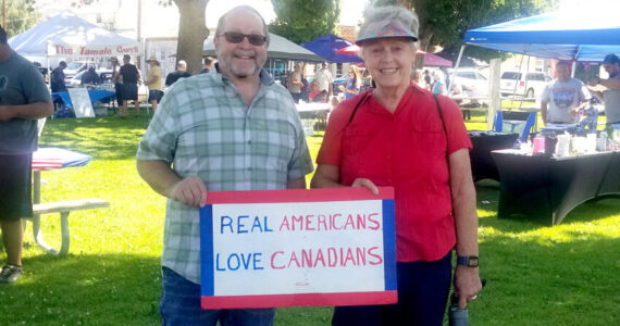 Oroville Mayor Ed Naillon and Osoyoos, BC Mayor Sue McKortoff met up at the Oroville Farmers’ Market on Saturday, June 28 to celebrate the proposed joining of the two communities as Sister Cities. Arnie Marchand approached the Oroville City Council a few meetings back and suggested that the two cities, only separated by a few miles and the International Boundary between the United States and Canada, pursue a Sister City relationship. Both communities and their mayors see the benefit and will be applying for Sister Cities status. Angela Larson/staff photo