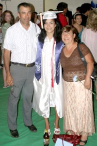 Photo by Gary DeVonJudy Roel receives congratulations from her parents Bob and Vera after last Saturday’s Commencement Ceremonies for the OHS Class of 2008.