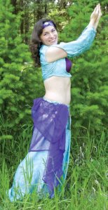 Submitted photo    Belly dance instructor Christy Cuellar-Wentz performs a solo routine in this picture taken recently by her husband. Cuellar-Wentz currently offers dance classes at the Community Cultural Cente