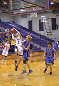 Oroville senior Luke Rowton goes up strong against SoapLake at Districts. The Hornet scored 11 points i