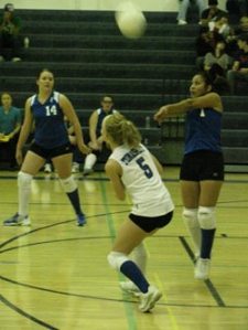Tonasket senior Maribella Alvarez hits the ball over teammate junior Brooke Ray’s head during Tonasket’s home game against Lake Roosevelt on Tuesday, Oct. 13 while senior April Webber waits on the side to get to the ball if it didn’t go over the net
