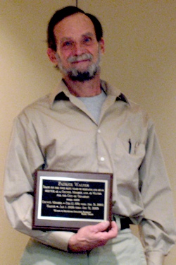 Outgoing Tonasket Mayor Patrick Walter received a plaque at the last regular city council meeting honoring his years of service.