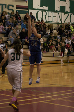 Tonasket senior April Webber makes a shot against the Chelan Goats during the Tigers away game on Saturday, Jan. 30. Photo by Les Bowen