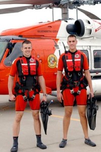 Darren Hicks (right) and a fellow Coast Guard Rescue Swimmer. File photo