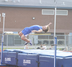 Tonasket sophomore John Stedtfeld bends over the bar in the high jump, clearing it, during the Tonasket Invitational track meet on Friday, April 16. Stedtfeld came in fifth place with a jump of 18-00.00. Photo by Emily Hanson