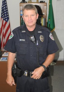 E. Todd Tumbleston is Oroville’s Code Enforcement officer. Tumbleston, who normally works as an unpaid reserve officer for Oroville, is being paid through a grant from the state Department of Trade and Economic Development. Photo by Gary DeVon
