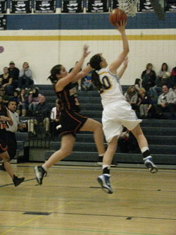 Tonasket senior Shelby Olma makes a lay-up shot against Bridgeport during the Lady Tigers’ home game on Tuesday, Dec. 7. Photo by Emily Hanson