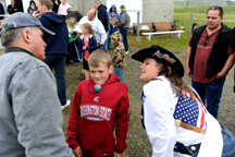 Members of the “Chesaw Cheaters,” including Chesaw Rodeo Queen Kristana, pass a ball from one to another as part of the Challenge Games held at this year’s Molson Midsummer Festival held last Saturday. The Cheaters won this challenge, but came in se
