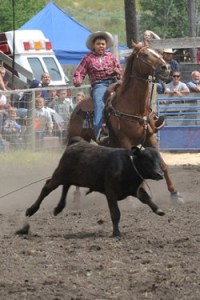 Oliver Williams was the only young cowboy to rope a calf in the junior cow-roping event at the Chesaw Fourth of July Rodeo. Photo by Gary DeVon