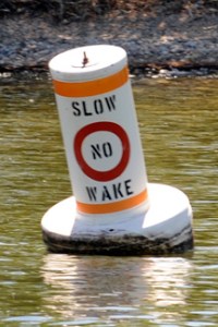 Buoys mark the channel where the No Wake Zone begins between Osoyoos Lake Veterans Memorial Park and Zosel Dam downstream. The slower speed helps to protect wildlife which are abundant in the area, as well as preventing shoreline erosion. Photos by Gary D