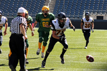 Hornet JD King just before he recovers a fumble and runs 27-yards for a touchdown for Oroville at the Emerald City Kickoff Classic at CenturyLink Field.  Photo by Tony Kindred