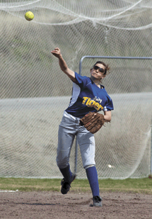 Amber Monroe fires a throw from shortstop during Saturday's doubleheader with Omak.