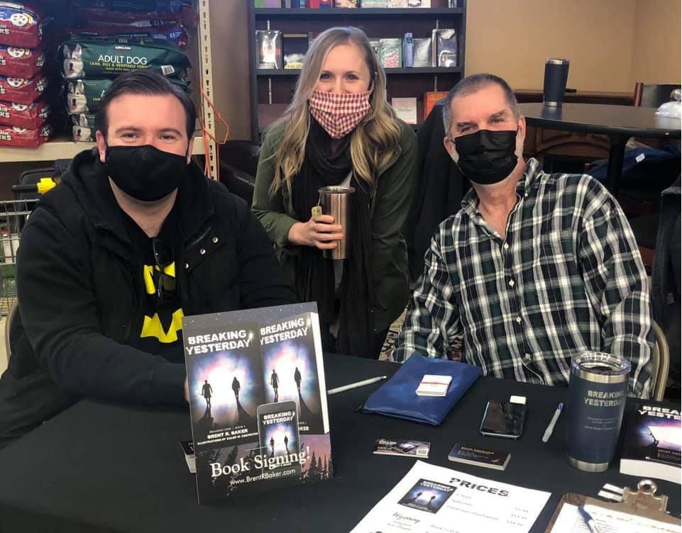 <em>On Feb. 12 local author Brent Baker (right) hosted a book signing party for his debut novel, Breaking Yesterday, at Beyers Market, along two other artists, Nicole Unser and Caleb Knowlton, who have worked with Baker on projects. </em>
Laura Knowlton/staff photo