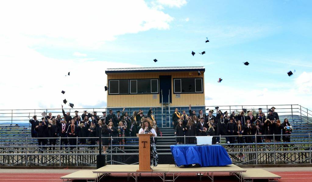 Submitted photo / Kelly Denison
Tonaskets graduating class of 2022 toss their hats.