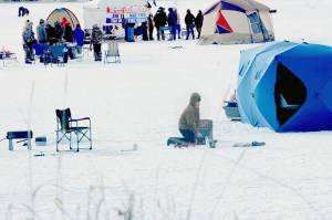 A scene from the 2021 NW Ice Fishing Festival at Sidley Lake in Molson. Whether you have an ice hut to sit in, a camp chair or a five-gallon bucket to sit on, the popular annual event sponsored by the Oroville Chamber of Commerce attracts anglers from all over the state to try and land a prize winning fish. Many use the festival to reconnect with relatives who remain in the Highlands or nearby Oroville.
<em>Gary DeVon/GT file photo </em>
