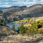 The McLoughlin Falls Ranch property is defined by towering stands of ponderosa pine, grassy benches above the river and dramatic, glacier carved cliffs that rise like sagebrush-covered stair steps along the meandering <em>Okanogan. Ellen Bishop/submitted photo </em>