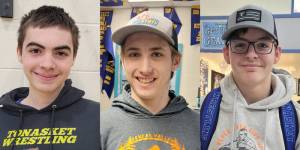 The three wrestlers going to Iowa to compete in the Folkstyle Nationals are, l-r, Casen Clark, Logan Stucker and Tace Plank. <em>Photos by Kristi Denison. </em>