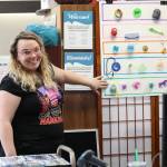 Tonasket librarian Sara Dunn invites readers of all ages to come check out the different summer crafting and reading activities held at the library. She said there is something for everyone and back by popular demand is the Guessing Jar. Summer readers can take a guess at how many starbursts are in the jar and win a prize. Laura Knowlton/staff photo