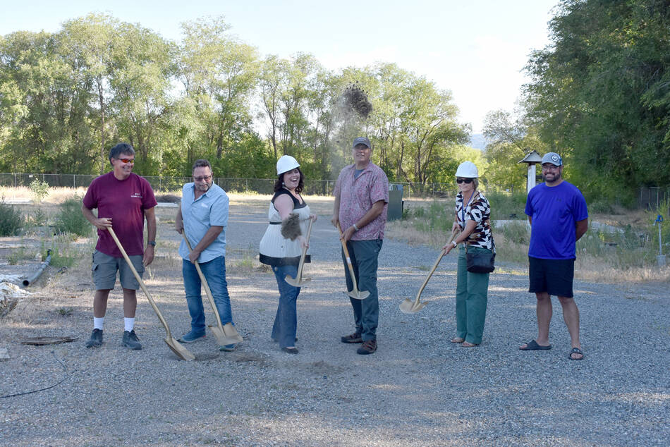 Okanogan County Commissioner Jon Neal, Oroville Mayor Ed Naillon, OHA Executive Director Ashley Range and OHA Commissioners Gary DeVon, Susan Speiker and Ben Peterson, turn the first shovels of dirt at the future site of the Oroville Orchard Apartments. <em>Submitte photo</em>