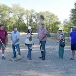 Okanogan County Commissioner Jon Neal, Oroville Mayor Ed Naillon, OHA Executive Director Ashley Range and OHA Commissioners Gary DeVon, Susan Speiker and Ben Peterson turn the first shovels of dirt at the future site of the Oroville Orchard Apartments. <em>Submitte photo</em>