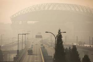 Lumen Field is hidden by smoke as seen from the Dr. Jose Rizal Bridge on Thursday, Oct. 20, 2022. (Amanda Snyder/Crosscut)
