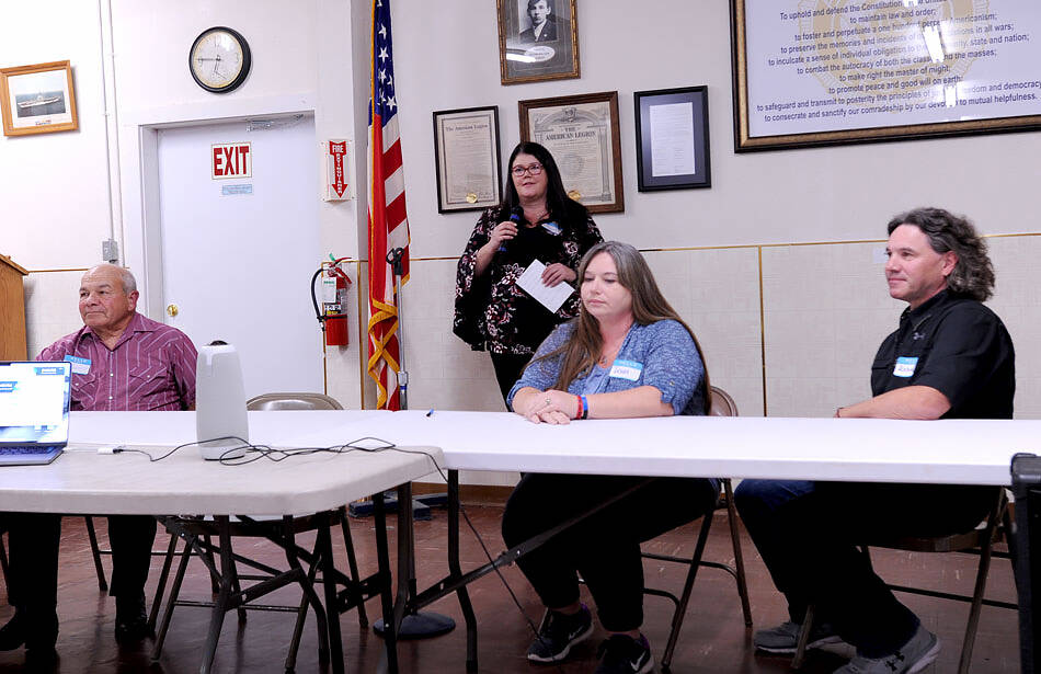 Candidates for Oroville City Council Walt Hart, Tasha Shaw and Robert Fuchs at the Candidates Forum sponsored by the Oroville Chamber of Commerce and the Okanogan Valley Gazette-Tribune. Hart, the incumbent is being challenged by Fuchs, a former councilman, for Position 4 on the council. Shaw, is being challenged by Paul Bouchard, who wasnt in attendance, for Position 1. Tonasket Councilwoman Teagan Levine, standing, served as moderator. <em>Gary De Von/staff photo</em>