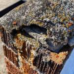 Evidence of erosion on the roof of the Molson Grange Hall.