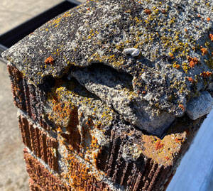 Evidence of erosion on the roof of the Molson Grange Hall.