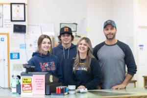 Jarvis and Becky Morrill, the new owners of the Loomis Kwik Stop, with their children Mahki and Sahana. Laura Knowlton/submitted photo