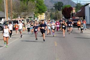 Gary DeVon/staff photos
Runners in the 42nd Annual May Festival Fun Run blast down Appleway for the start of the race. Runners, and walkers, participated in either a 5K or two-mile race.