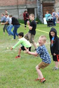 GT File Photo
Among the kids games is the water balloon toss, which on a hot day is a fun way to lose if it cools you off. There was also a sack race, egg toss, three-legged sack race and a coin scramble through the sawdust pile.