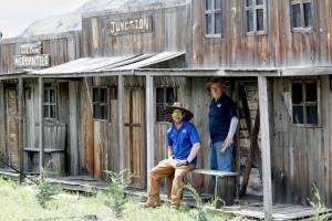 Anthony Katsonis and Robert Schardein of Silverline Lakeside Resort, Winthrop, work to carefully dismantle the old town facade to relocate to its new home. Laura Knowlton/staff photo