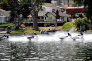 The annual Lake Osoyoos Cup Jet Ski Races were held last Saturday and Sunday at Orovilles Deep Bay Park. In this race all the racers begin in a line and charge off to the course when they get the signal. <em>Gary De Von/staff photo </em>