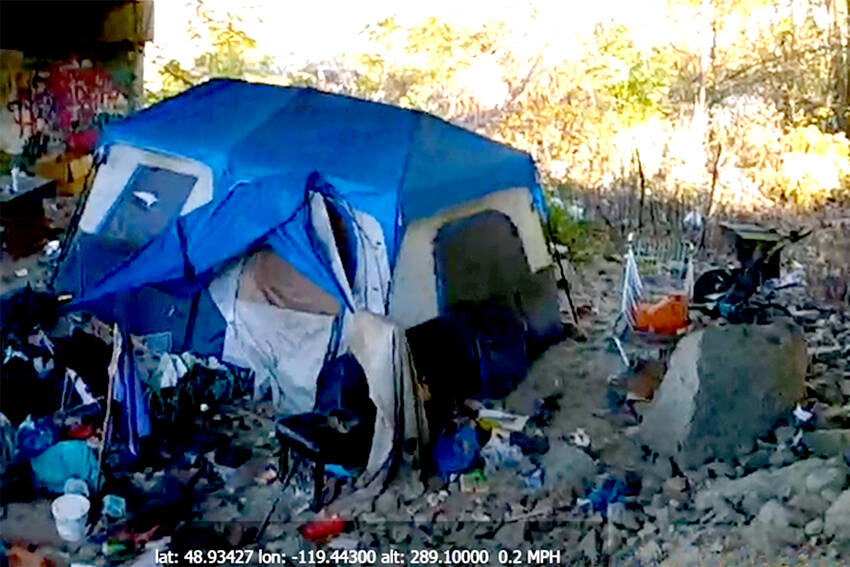 One of thephotos of the homeless camp under the 12th Street Bridge that were shared with the Okanogan County Commissioners prior to the camp and garbage being cleaned up by the Okanogan County Public Works Department and the Sheriffs Office. Submitted photo/Okanogan County