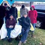 Jeff and Elia Bunnell watch as the new sign naming Orovilles Triangle Park as Jeff Bunnell Park last Saturday. There were many kind words spoken about Bunnell, who started the Oroville Initiative (TOI) and has volunteered many hours trying to improve Oroville. The former Triangle Park is the project he says he is most proud of.. Gary DeVon/staff photos