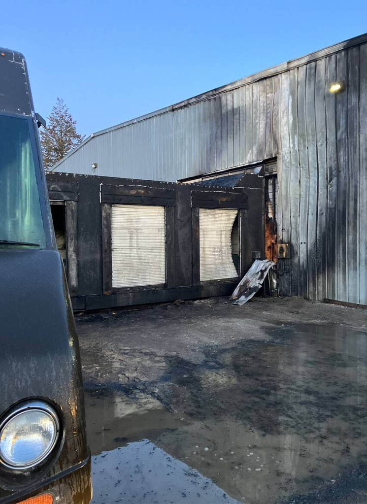 Some of the fire damage at the UPS loading dock in Omak. The fire is suspected to have broken out after a suspect is alleged to have drilled into a UPS trucks gas tank and a spark from the drill set the truck ablaze. OPD/submitted photo
