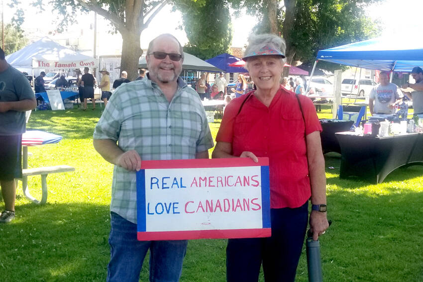 Oroville Mayor Ed Naillon and Osoyoos, BC Mayor Sue McKortoff met up at the Oroville Farmers Market on Saturday, June 28 to celebrate the proposed joining of the two communities as Sister Cities. Arnie Marchand approached the Oroville City Council a few meetings back and suggested that the two cities, only separated by a few miles and the International Boundary between the United States and Canada, pursue a Sister City relationship. Both communities and their mayors see the benefit and will be applying for Sister Cities status. Angela Larson/staff photo