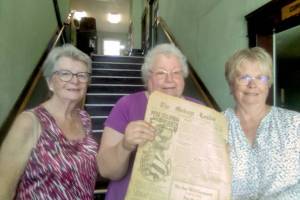 Donna St. John, who helped deliver the old <em>Molson Leader</em> and <em>Oroville Gazette</em> issues to the Molson Schoolhouse Museum with museum volunteer Joanie Emry Raymond and Janet Barstow, manager of the Roy M. Chatters Newspaper and Printing Museum. Salley Bull/submitted photos