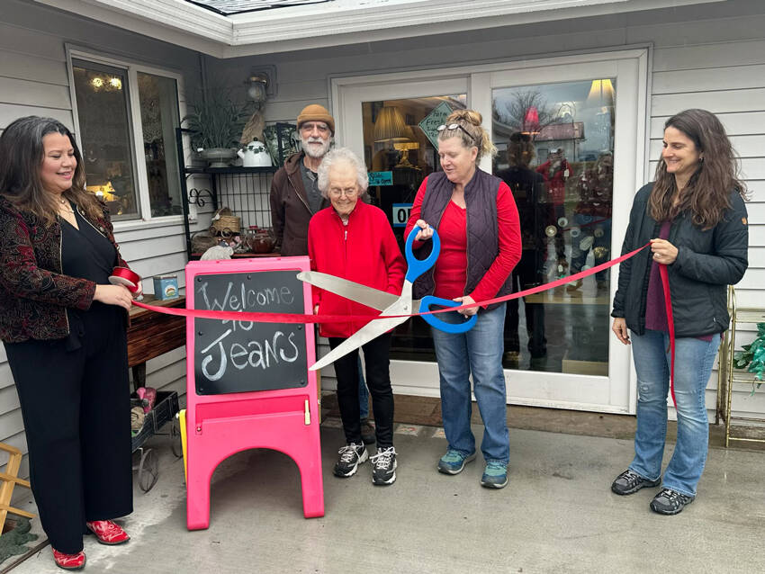 Jean Cooksey, 91, owner, along with her daughter Susan Cooksey, and Dave Martin were joined by Tonasket Mayor Alisa Weddle, Aisha Rodriguez and members of the Tonasket Chamber of Commerce, on Saturday morning to celebrate the reopening of Jeans on 3rd. Laura Knowlton/staff photo