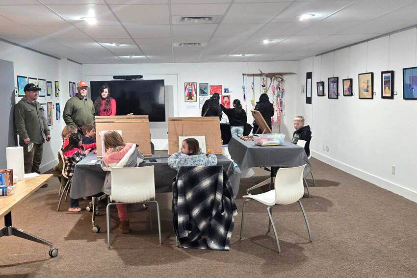 Some young artists try work on art projects while parents and friends take in the art exhibition at the Guild Art Center and Gallery. The exhibit is open to the public Monday through Saturday until March 31. Submitted photo